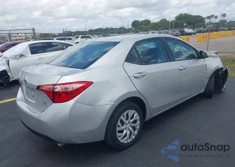 2018 Toyota Corolla Le z USA, uszkodzony, nr VIN 5YFBURHEXJP811345